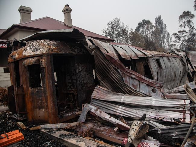 The remains of a burnt-out train carriage that used to be a cafe in Cobargo. Picture: AAP Image/James Gourley