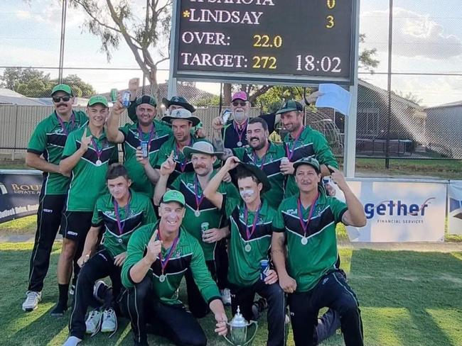 Doveton shows off the Turf 2 premiership cup.