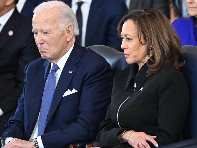 (L-R) US President Joe Biden and Vice President Kamala Harris attend the inauguration ceremony before Donald Trump is sworn in as the 47th US President in the US Capitol Rotunda in Washington, DC, on January 20, 2025. (Photo by SAUL LOEB / POOL / AFP)