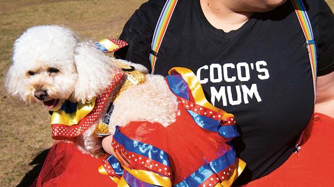 Coco with her owner at the birthday party. Picture: Nic Walker