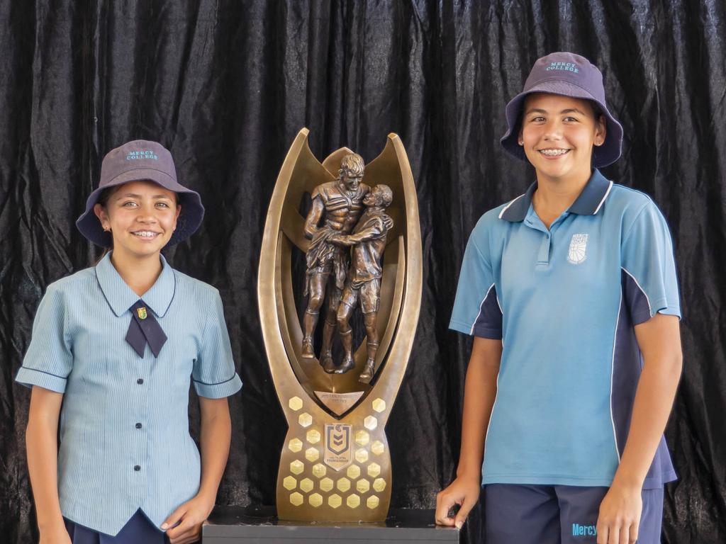 Mercy College students lined up for photos with the NRL premiership trophy on Thursday. Picture: Contributed