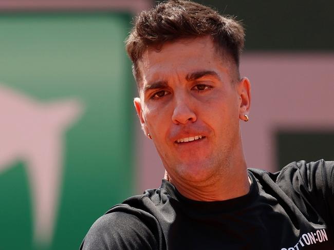 PARIS, FRANCE - MAY 28: Thanasi Kokkinakis of Australia plays a forehand against Daniel Evans of Great Britain during their Men's Singles First Round Match on Day One of the at Roland Garros on May 28, 2023 in Paris, France. (Photo by Clive Brunskill/Getty Images)