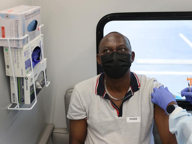 A man receives a COVID vaccine in Florida. The US will send 20 million doses to struggling countries. Picture: Getty Images/AFP