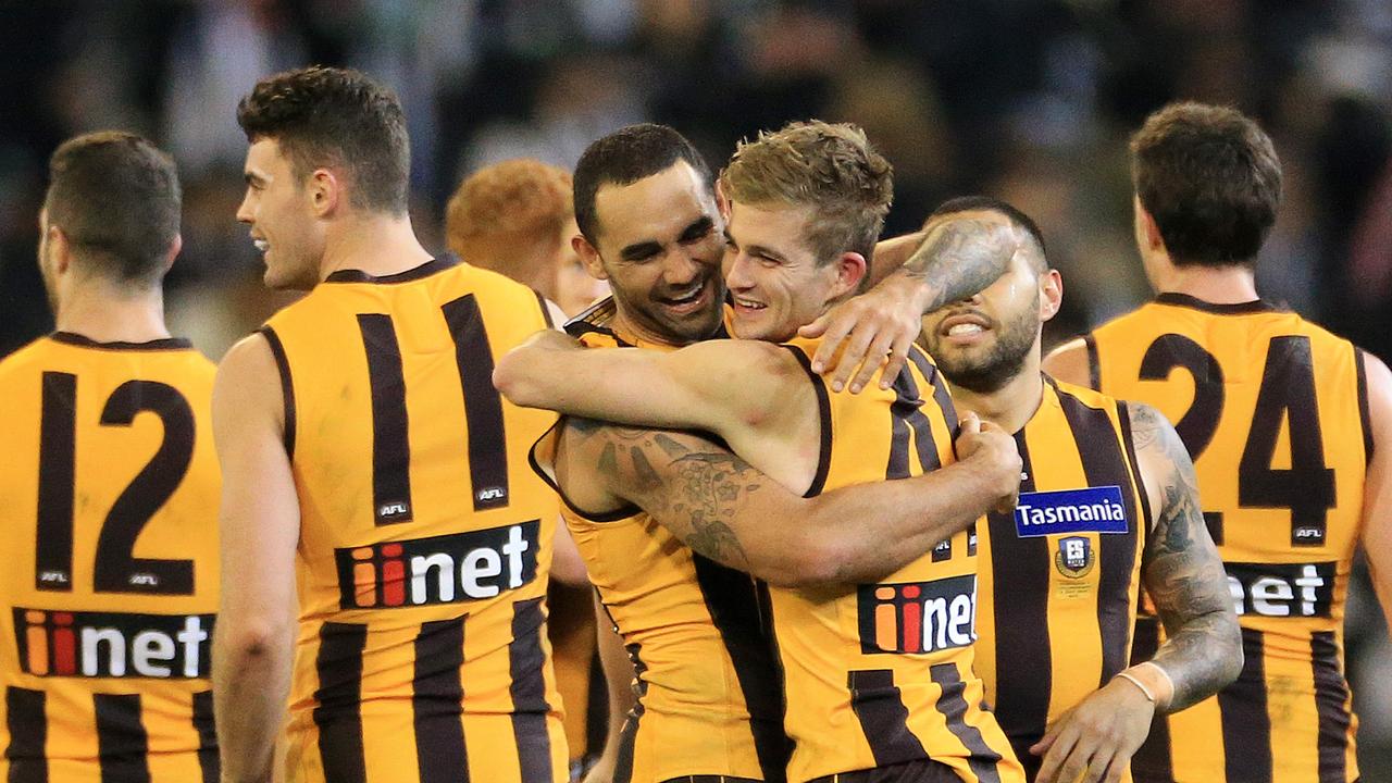 Shaun Burgoyne and Oliver Hanrahan celebrate a win over Collingwood