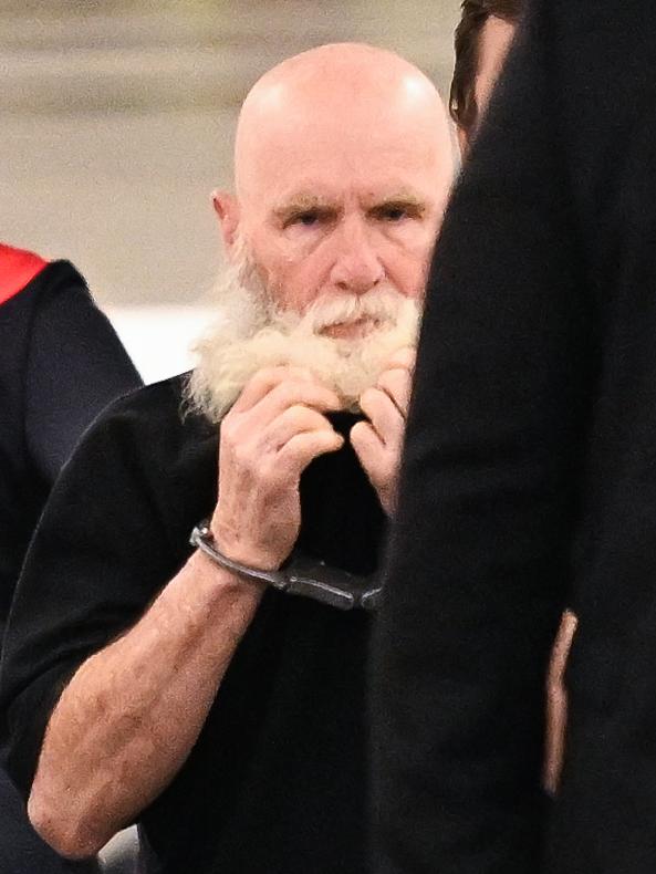 Lees arrives at Brisbane airport after being extradited from Sydney. Picture: Dan Peled / NewsWire