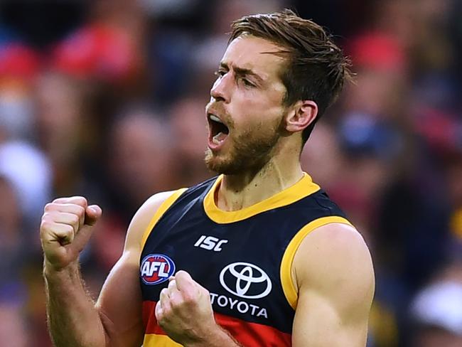 ADELAIDE, AUSTRALIA - AUGUST 17: Richard Douglas of the Adelaide Crows celebrates a goal during the round 22 AFL match between the Adelaide Crows and the Collingwood Magpies at Adelaide Oval on August 17, 2019 in Adelaide, Australia. (Photo by Mark Brake/Getty Images)