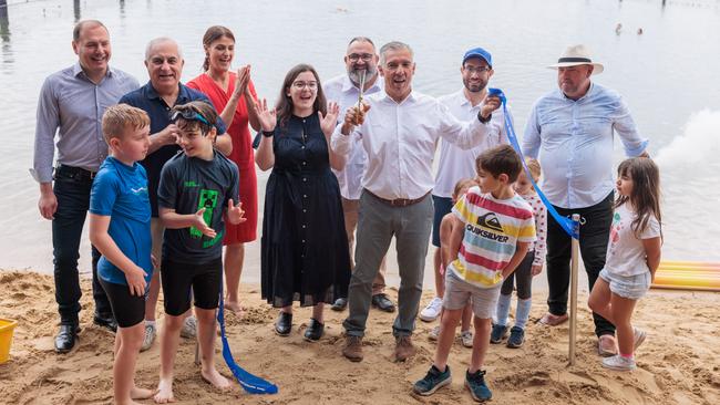 Canada Bay deputy mayor Stephanie Di Pasqua (middle), mayor Angelo Tsirekas (fifth-right) and Parramatta River Catchment Group chair Mark Drury (second-right) open the swim site alongside other councillors and excited children. Picture: Ben Williams