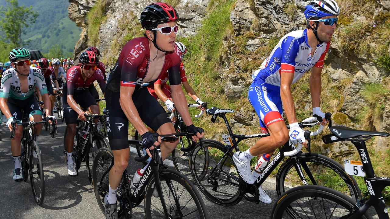 Welsh cyclist Geraint Thomas and France’s Thibaut Pinot (right) compete in the 2019 Tour De France.