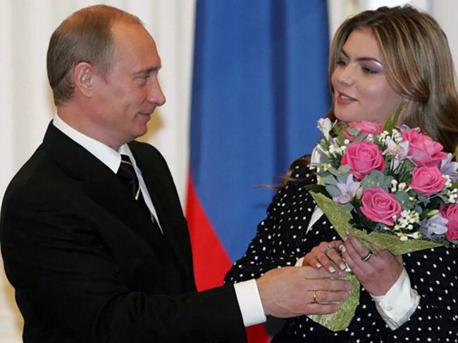 One of the few images of the pair together shows Putin and Kabaeva after she received an award in the Kremlin's Yekaterina hall.