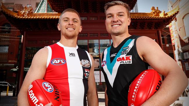 St Kilda’s Sebastian Ross of the Saints and Port’s Ollie Wines promote June’s clash in Shanghai. Picture: Michael Willson/AFL Media/Getty Images