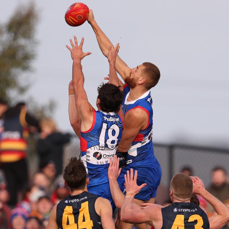 Liam Jones of the Bulldogs punches the ball during the round 10 AFL match between Western Bulldogs and Adelaide Crows at Mars Stadium, on May 20, 2023, in Ballarat, Australia. (Photo by Robert Cianflone/Getty Images)