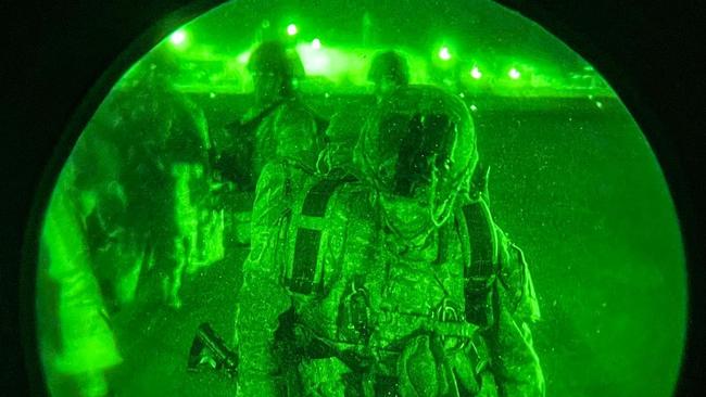 Paratroopers assigned to the 82nd Airborne Division prepare to board a U.S. Air Force C-17 at the Hamid Karzai International Airport. PIcture: AFP / Master Sgt. Alexander Burnett /US Army