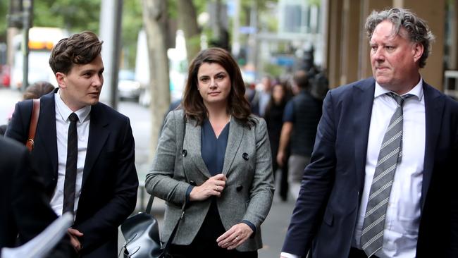 Author and journalist Louise Milligan and partner Nick Leys, right, after testifying at the committal hearing of Cardinal George Pell, at the Magistrates Court in Melbourne. Picture: Stuart McEvoy.