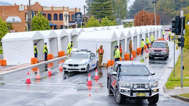 A road block set up at the NSW border to stop Victorians entering. Picture: Simon Dallinger