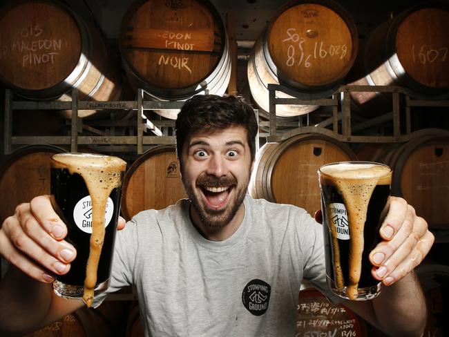 Beer lover Nick Malin knocks back a Stave Breaker — Russian Imperial Stout, whisky oak barrel aged, at Stomping Ground Brewery, Collingwood.