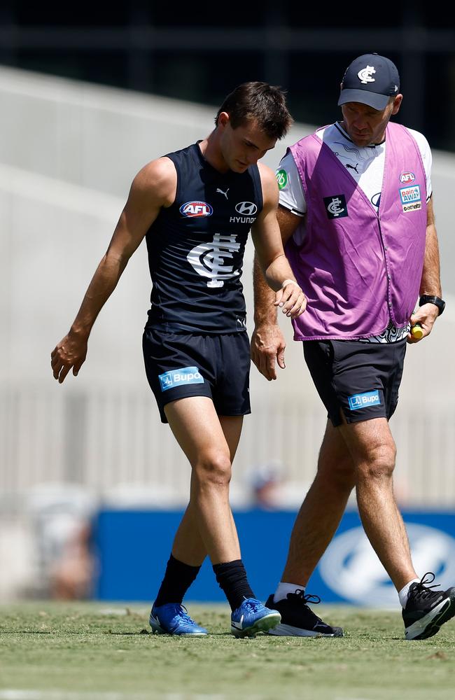 Jagga Smith leaves the field. Picture: Michael Willson/AFL Photos via Getty Images.