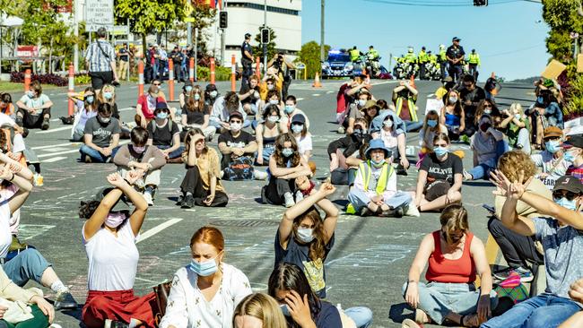 Refugee protesters at Kangaroo Point in July. Activists are now threatening a protest will shut down the Story Bridge on Saturday. Picture: Richard Walker