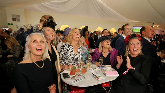 Paula Dwyer with her sisters Megan, Eleanor, Phillipa &amp; Gabrielle at Tabcorp in the Birdcage at Flemington Race Course on Oaks Day. Picture: Stuart McEvoy.