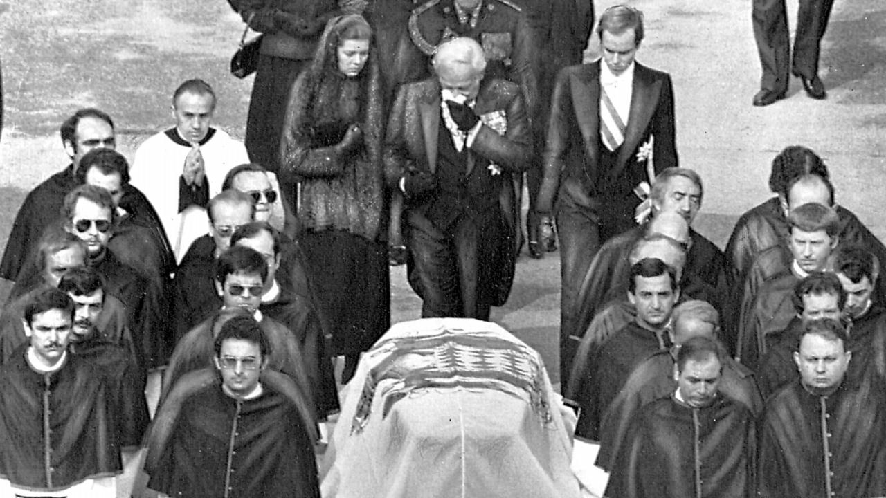 Prince Rainier with children Caroline and Albert at funeral of Princess Grace in 1982.