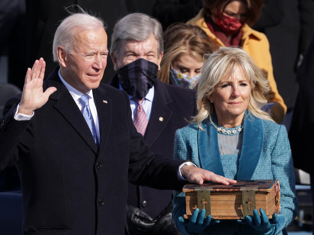 Surrounded by friends, family, political allies, political enemies and 25,000 national guardsmen, Joe Biden was sworn in. Picture: AFP