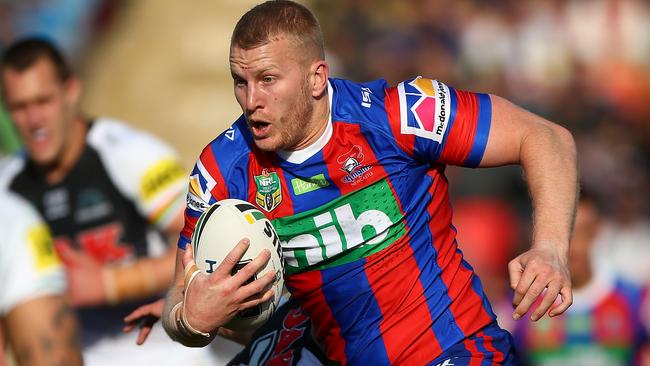 SYDNEY, AUSTRALIA - AUGUST 18: Mitchell Barnett of the Knights runs the ball during the round 23 NRL match between the Penrith Panthers and the Newcastle Knights at Panthers Stadium on August 18, 2018 in Sydney, Australia. (Photo by Matt Blyth/Getty Images)