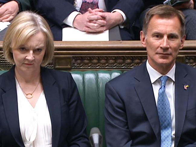 Britain's Prime Minister Liz Truss (L) with Jeremy Hunt. Picture: AFP