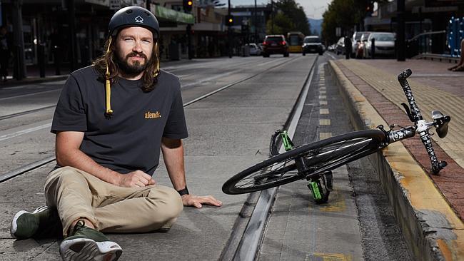 Gareth Williams, who rides his bike to work on Jetty Rd each day, at the stop 16 trouble spot. Picture: Matt Loxton.