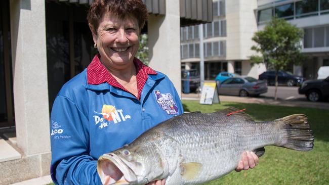 Sue Swindale with the $10,000 barramundi she caught in this year’s Million Dollar Fish competition.