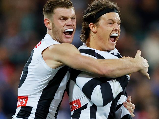 ADELAIDE, AUSTRALIA - APRIL 16: Jack Ginnivan of the Magpies celebrates a goal with Taylor Adams during the 2023 AFL Round 05 match between the Collingwood Magpies and the St Kilda Saints at Adelaide Oval on April 16, 2023 in Adelaide, Australia. (Photo by Dylan Burns/AFL Photos via Getty Images)