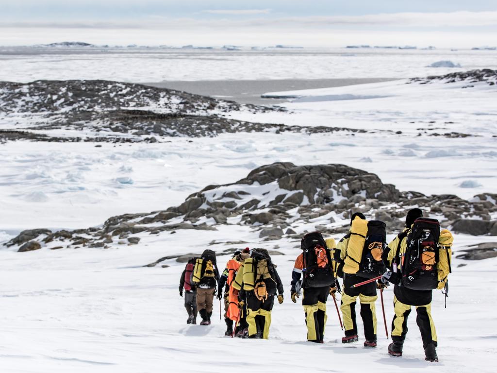 Australian Antarctic Division expeditioners in the Antarctic. Picture: Courtesy of the AAD,