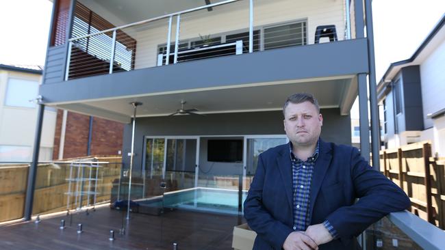 David Adams at his unfinished Q1 home at wavell Heights. Pic: Annette Dew