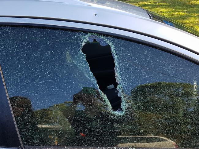 Up to 20 cars had their windows smashed around Bateau Bay by a group of people who hung out of a car window and hit random cars with a tomahawk or some other weapon. Picture: supplied.