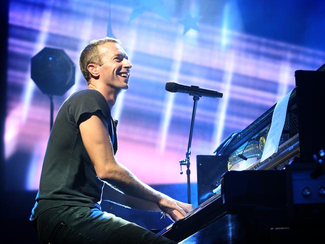 All smiles ... Frontman Chris Martin fed off the electric energy of diehard fans who packed the Enmore. Picture: Richard Dobson