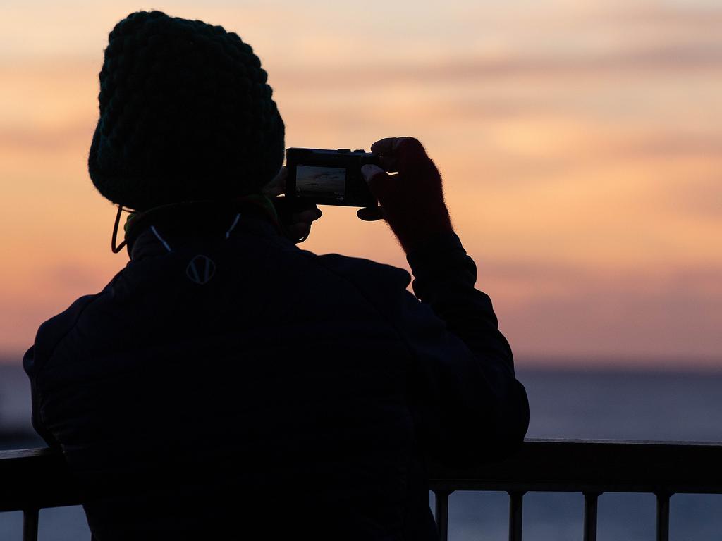 The beautiful sunrise at Bondi Beach and other early morning experiences should be marketed to international tourists, Angela Mollard writes. Picture: NewsWire