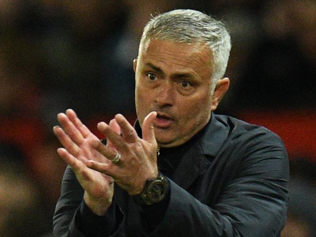 Manchester United's Portuguese manager Jose Mourinho gestures during the English Premier League football match between Manchester United and Newcastle at Old Trafford in Manchester, north west England, on October 6, 2018. (Photo by Oli SCARFF / AFP) / RESTRICTED TO EDITORIAL USE. No use with unauthorized audio, video, data, fixture lists, club/league logos or 'live' services. Online in-match use limited to 120 images. An additional 40 images may be used in extra time. No video emulation. Social media in-match use limited to 120 images. An additional 40 images may be used in extra time. No use in betting publications, games or single club/league/player publications. /