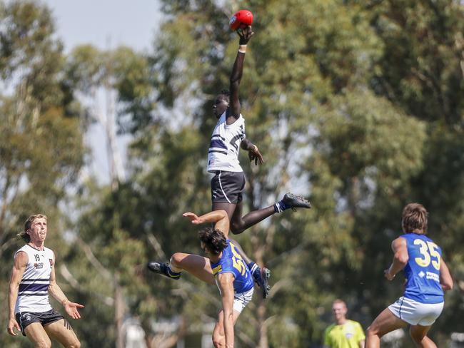 NAB League boys: Northern Knights v Western Jets. Akuei Dominic (Northern) and Paul Tsapatolis (Western). Picture: Valeriu. Campan