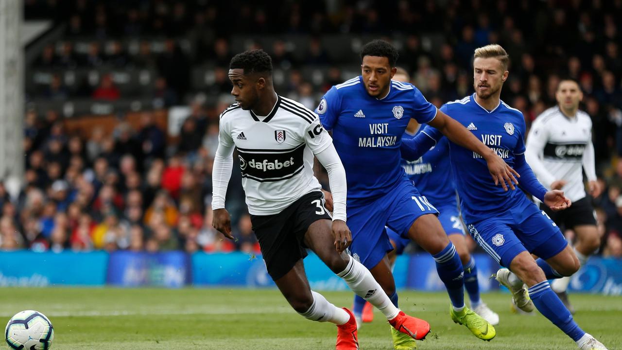 Fulham's English defender Ryan Sessegnon (L) has secured a move to Tottenham. (Photo by Ian KINGTON / AFP)
