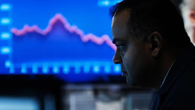 Traders in New York watch a market downturn. The $30bn Equip super fund is preparing for Australia to fall into a recession. Picture: Spencer Platt/Getty Images