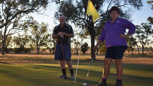 Roma Golf Club president Mark Hall and member Tania Beck are able to enjoy games despite COVID-19, with the course still open to members only.