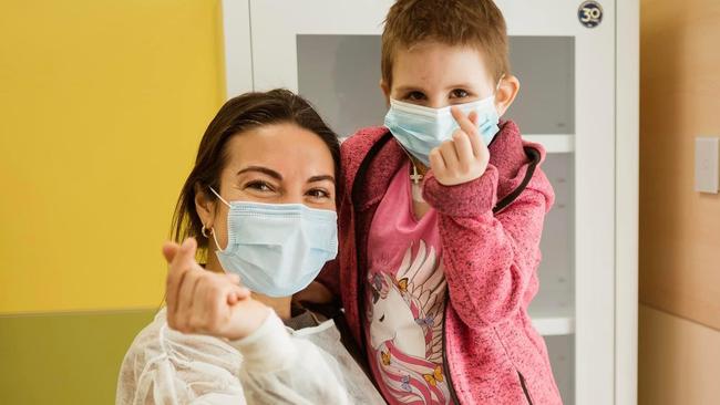 Svitlana Pugach with a patient in Ukraine