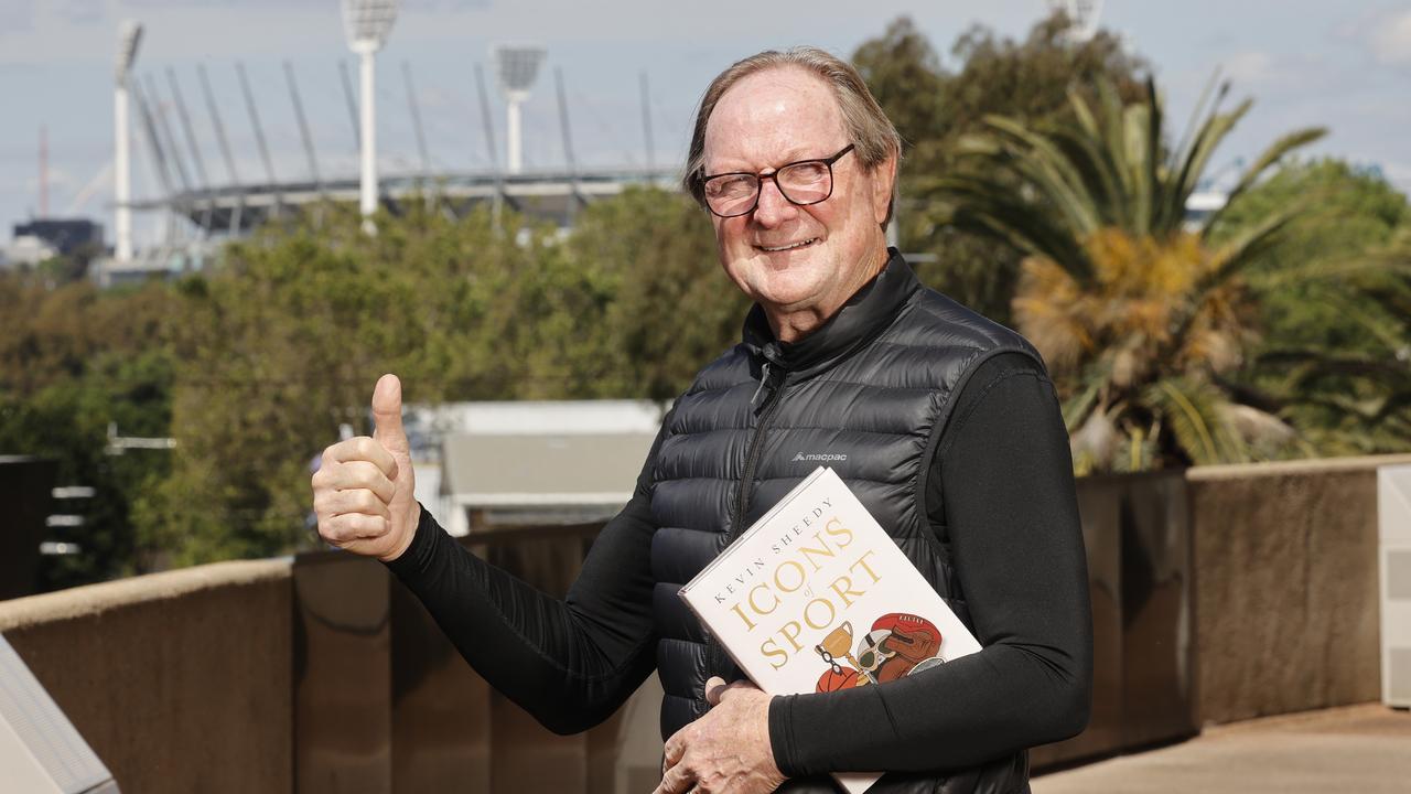 AFL legend Kevin Sheedy with his new book, Icons of Sport. Picture: Alex Coppel