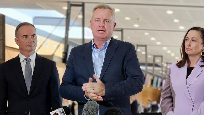 Hobart Airport CEO Norris Carter, Premier Jeremy Rockliff and Tourism Industry Council of Tasmania CEO Amy Hills speak to the media at Hobart International Airport on Monday, 18 November 2024