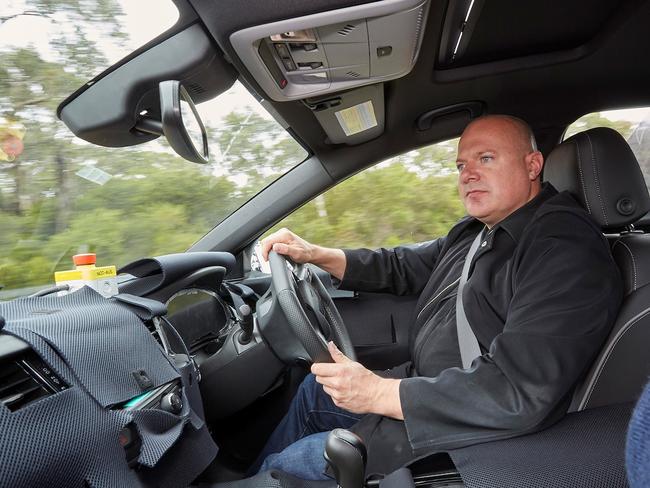 News Corp's motoring editor Joshua Dowling, pictured test driving a camouflaged version of the 2018 Holden Commodore. Picture: Supplied