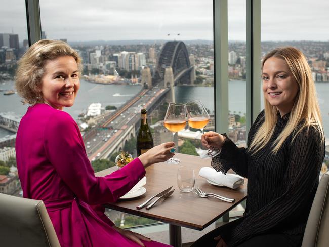 Deane Brosnan and Marlii Carroll enjoy a glass of fine Aussie sparkling at the Altitude Restaurant in The Shangri-La Hotel in Sydney. Picture: Julian Andrews