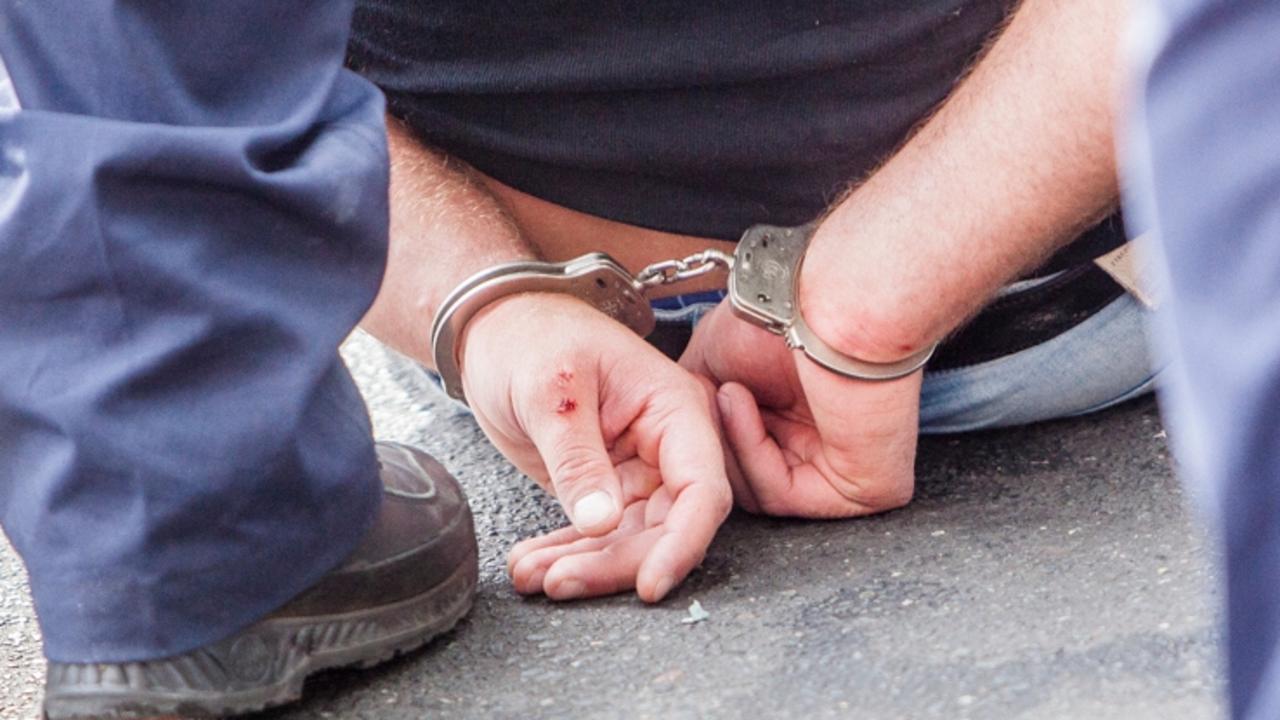 Mackay police arrested parents near a primary school after they tried to take their daughter against the orders of Child Safety.