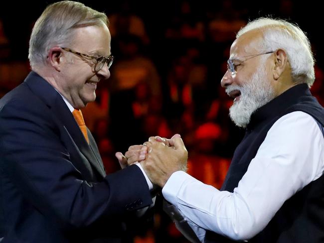 SYDNEY, AUSTRALIA - MAY 23: India's Prime Minister Narendra Modi (R) and Australia's Prime Minister Anthony Albanese shake hands while attending an Indian cultural event on May 23, 2023 at the Qudos Bank Arena in Sydney, Australia. Modi is visiting Australia on the heels of his and Australia's Prime Minister Anthony Albanese's participation in the G7 Summit in Japan. (Photo by Lisa Maree Williams/Getty Images) *** BESTPIX ***