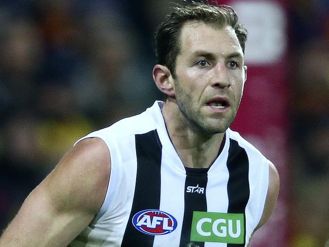 AFL - Adelaide Crows v Collingwood at Adelaide Oval. Travis Cloke and his glove. Picture Sarah Reed