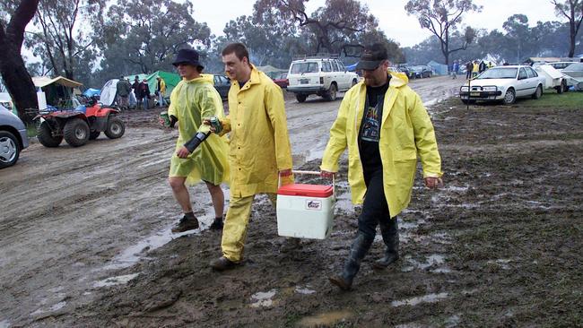 Campers carry beer to Mount Panorama during a previous edition of the race.