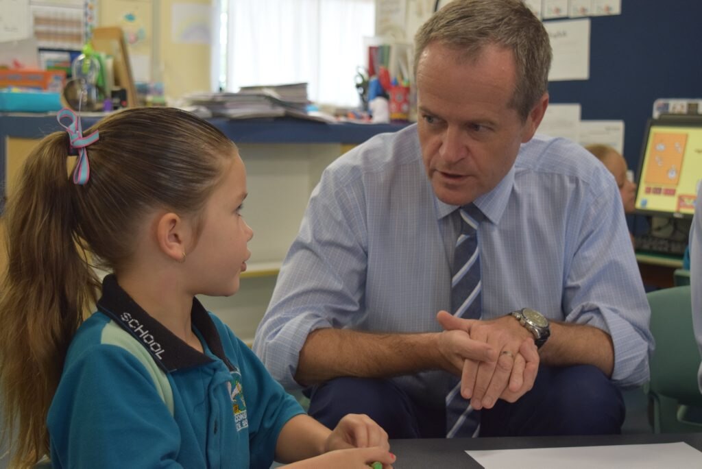 Five-year-old Sophia Jackson talks earnestly with Leader of the Opposition Bill Shorten. Photo: Emily Smith