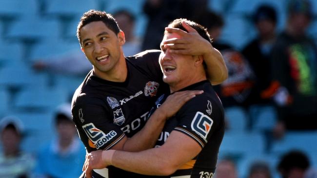 Benji Marshall and Chris Heighington celebrate a try for the Tigers. Picture: Gregg Porteous